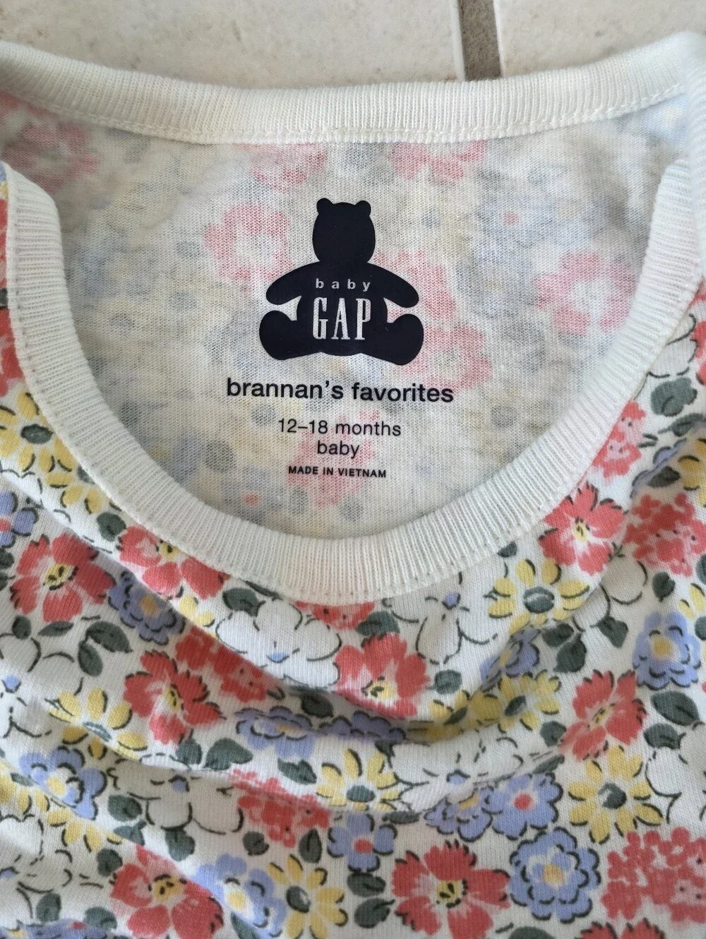 Floral Flutter-Sleeve Baby One-Piece - White with Pink, Yellow & Blue Flowers